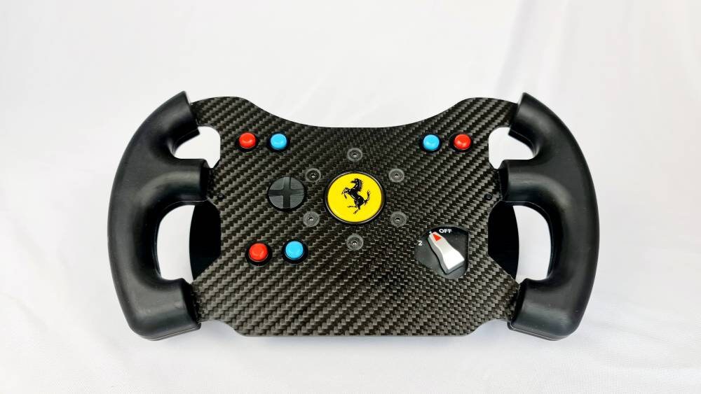 Volante Ferrari F1 – Thrustmaster - Hi-Speed Simuladores