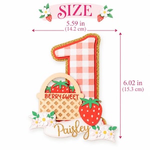 Size chart for strawberry number 1 cake topper: 5.59 inches wide by 6.02 inches tall (14.2 x 15.3 cm)