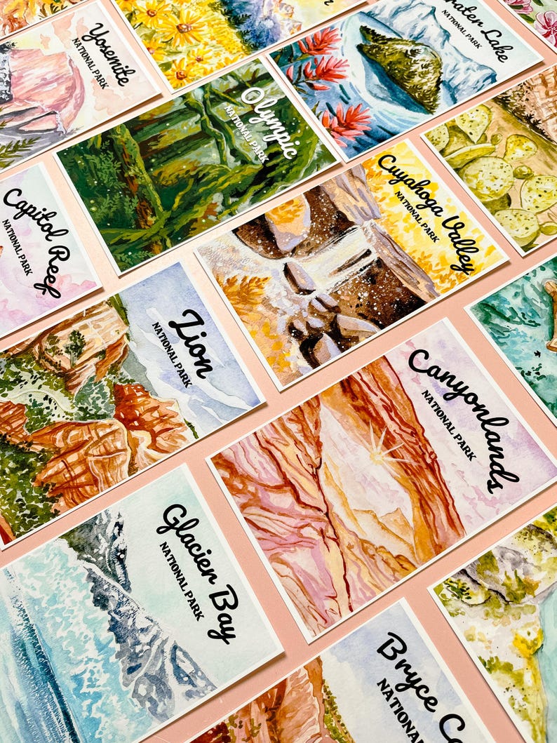 May include: A collection of watercolor paintings depicting various national parks in the United States. Each painting features the name of the park and "National Park" written below. The parks featured are Yosemite, Crater Lake, Olympic, Cuyahoga Valley, Canyonlands, Capitol Reef, Lion, Glacier Bay, and Bryce Canyon.