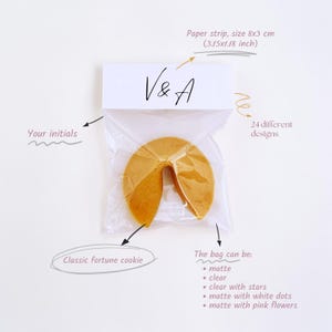 May include: A set of three ceramic mugs with a speckled, matte finish. The mugs are in shades of cream, light gray, and dark gray. Each mug has a simple, minimalist design and a rounded handle.