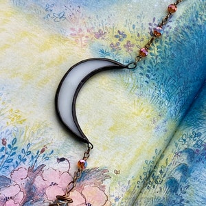 Witte maansikkel-zonnevanger