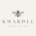 Kmardll store logo