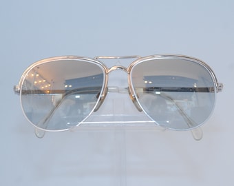 Serge Kirchhofer goldish sunglasse, Miami style, grey-gold color, with gold aluchromic patterns on grey color, made in Germany