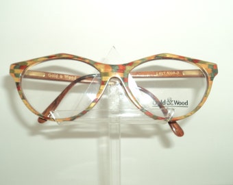 Gold and wood stylish eye-wear, multicolor wood with special face form, gold plated insertions, Palm-springs style made in Paris