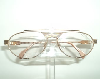 Silhouette goldish eye-wear, model 6161, circular-oval face form; rich look made in Austria