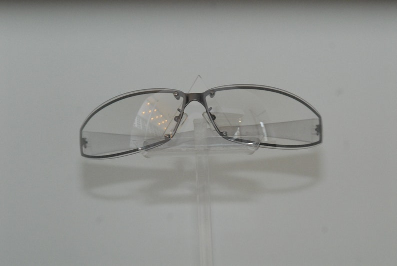 Coco lunettes new Gwen gallagher eye-wear; protective curved metallic face form with soft branches insertions Parisian style and soft look