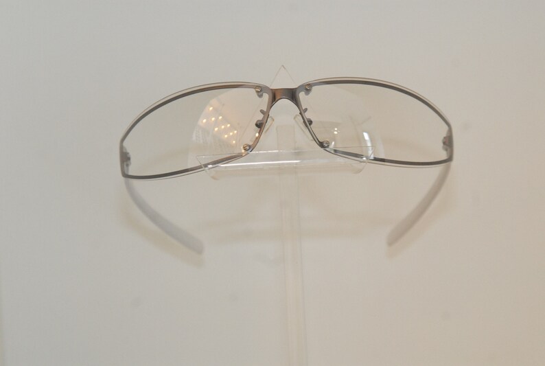 Coco lunettes new Gwen gallagher eye-wear; protective curved metallic face form with soft branches insertions Parisian style and soft look
