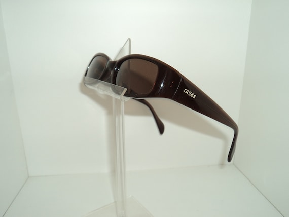 Where are guess sales sunglasses made