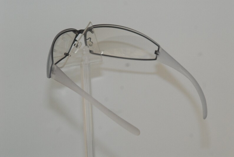 Coco lunettes new Gwen gallagher eye-wear; protective curved metallic face form with soft branches insertions Parisian style and soft look
