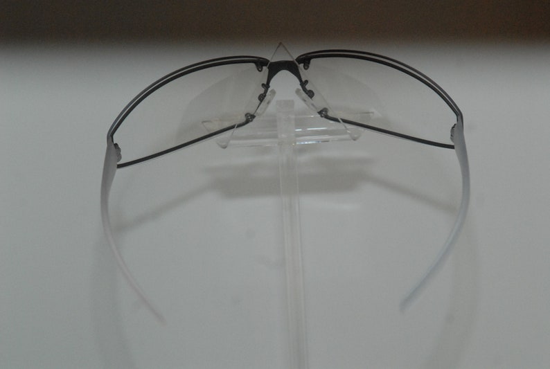 Coco lunettes new Gwen gallagher eye-wear; protective curved metallic face form with soft branches insertions Parisian style and soft look