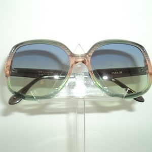 Caber creation's sunglasses, model 28, shinig oinky-green color in cellulose acetate, new parisian style, made designed by Caber