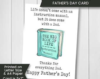 May include: A printable Father's Day card featuring a light blue book illustration with the text "The Big Book of Life" and "Instruction Manual". The card reads "Life doesn't come with an instruction manual, but it does come with a Dad. Thanks for everything Dad. Happy Father's Day!" The card is printed on A4 or letter size paper and measures 5x7 inches when folded.