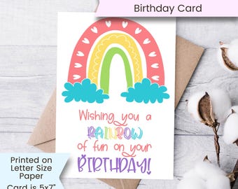 May include: A printable birthday card featuring a rainbow with clouds and the text "Wishing you a rainbow of fun on your birthday!" The card is 5x7 inches when folded.