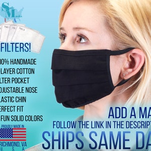 May include: A black face mask with a pleated design is shown, along with several white PM2.5 filters. The mask features a filter pocket, adjustable nose, and elastic chin. The text highlights the mask's handmade construction and availability in seven solid colors. The image also includes the text "Add a Mask" and "Follow the link in the description!"