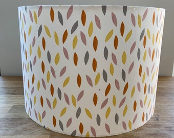 Handmade drum lampshade, white with multi coloured dash / leaf pattern.