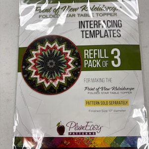 May include: A package for a folded star table topper. The package includes interfacing templates and a refill pack of 3. The finished size is 43 cm in diameter. The package has text that reads "Point of View Kaleidoscope" and "Plum Easy Patterns."