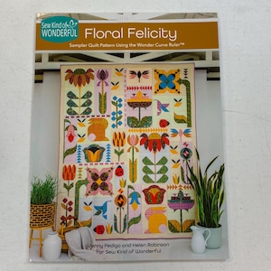 May include: A quilt pattern titled "Floral Felicity" by Sew Kind of Wonderful. The pattern features a colorful floral design with various shapes and patterns. The cover includes text: "Sampler Quilt Pattern Using the Wonder Curve Ruler™".