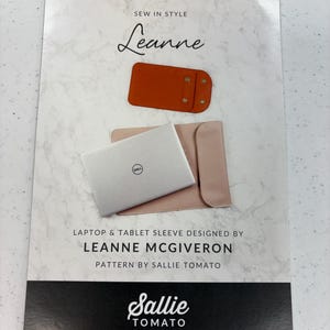 May include: A sewing pattern for a laptop and tablet sleeve, designed by Leanne McGiveron. The pattern is by Sallie Tomato, a company that sells quality sewing patterns and purse supplies.