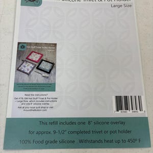 May include: A white package labeled "Refill Silicone Trivet & Pot Holder" with a large size designation. The package includes a smaller image of trivets and pot holders. The text indicates the refill includes an 8-inch silicone overlay.