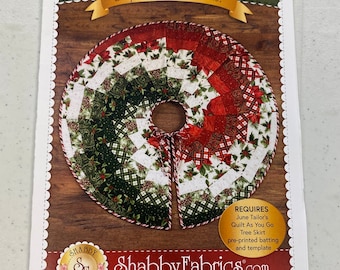 May include: A pattern for a Bargello Christmas tree skirt, with a red, green, and white design. The pattern is titled "Simple Quilt As You Go!" and includes instructions for making the skirt. It also requires pre-printed batting and a template.
