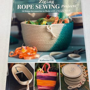 May include: Book cover featuring the title "Zigzag Rope Sewing Projects: 16 Home Accessories to Make with a Simple Stitch" by Katherine Lile. The cover shows three different rope projects: a teal and natural rope basket, a multi-colored rope tote bag, and a stack of natural rope coasters.