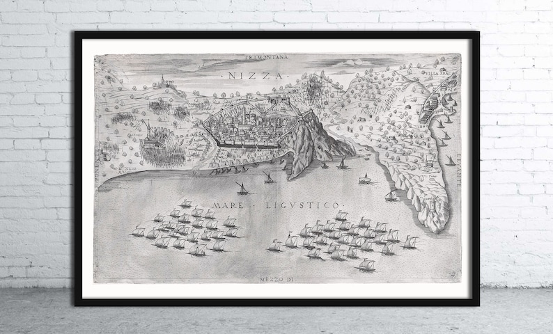 May include: A black and white vintage map of the city of Nizza, Italy. The map shows the city's layout, including its streets, buildings, and surrounding landscape. The map is titled 'NIZZA' and includes the text 'TRAMONTANA' and 'MARE LIGVSTICO.' The map also shows a fleet of ships in the sea below the city.