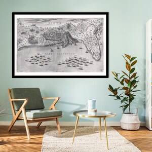 May include: A black and white framed print of a vintage map depicting a naval battle. The map is titled 'MARE LICVSTICO' and shows a coastal city with ships in the water.