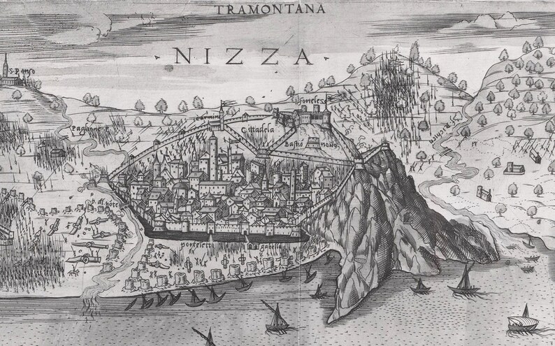 May include: A black and white engraving of the city of Nice, France. The engraving shows the city's fortifications, buildings, and surrounding landscape. The text 'TRAMONTANA' and 'NIZZA' are visible at the top of the engraving.