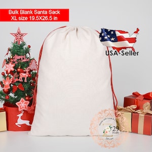 May include: A large white canvas Santa sack with red drawstring, measuring 19.5 inches by 26.5 inches. The sack is sitting on a white surface with a small Christmas tree and wrapped gifts in the background. The text "Bulk Blank Santa Sack XL size 19.5X26.5 in" is at the top of the image. The text "USA-Seller" is in the upper right corner of the image. The text "Made with Love & Care by 529 Studio 229.com" is at the bottom of the image.