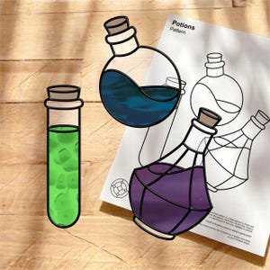May include: An illustration of potion bottles with colourful liquids and a pattern sheet. The bottles include a test tube with green liquid, a round bottle with blue liquid, and a geometric bottle with purple liquid.