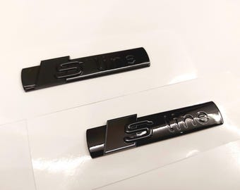 2x Sline emblem, black glossy, new product in foil, lettering.....fits all Audi models, A1, A2, A3, A4, A5, A6, A7, A8, S1, S3, S4....