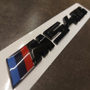 Bmw M540i emblem black glossy new in foil, lettering M240i, M535i, M550i, M335i, M235i, M435i, M140i.....