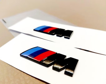 2 pieces BMW M emblem black glossy new in foil, 45 x 15 mm, suitable for the fenders, lettering.....