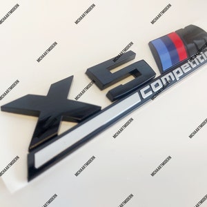 BMW X5M Competition Emblem, Schwarz Glänzend Neuware in Folie, Schriftzug.....passend für alle X5 Modelle