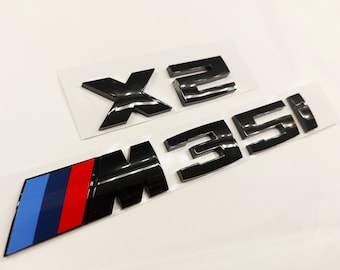 BMW X2M35i emblem, glossy black, new in foil, lettering