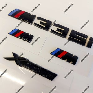 Bmw M335i set, 2 x M emblems for the fenders (45 x 15 mm) + M 335i trunk + Xdrive black shiny new item in foil, lettering, badge