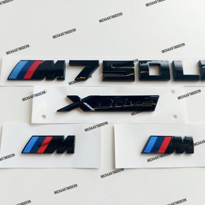 Bmw M750LI set, 2 x M emblem for the fenders (45 x 15 mm) + M 750 LI trunk + Xdrive black glossy new in foil, lettering, badge