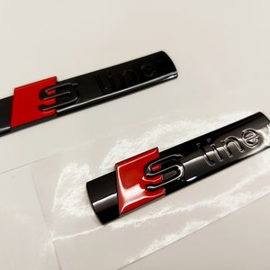 2x Sline emblems, glossy black, new product in foil, lettering.....fits all Audi models, A1, A2, A3, A4, A5, A6, A7, A8, S1, S3, S4....