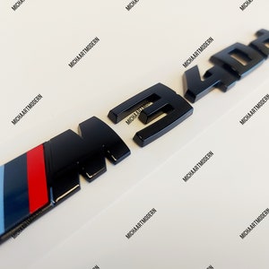 Bmw M340d emblem black glossy new in foil, lettering M240i, M540i, M550i, M535i, M335i,M435i, M140i.....3 series BMW, 5 series, 1 series, 2 series,