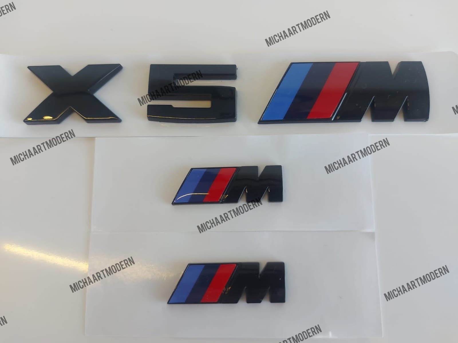 100 x Aufkleber für BMW Zeichen / Emblem 1 2 3 4 5 6 7 8 M X - schwarz  glänzend