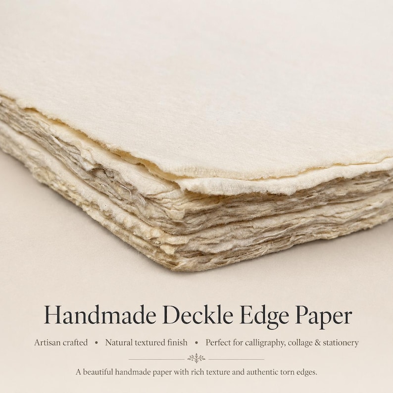 May include: A stack of off-white handmade paper featuring uneven, fibrous deckle edges and a visible, coarse texture. The text on the image reads: Handmade Deckle Edge Paper, Artisan crafted, Natural textured finish, Perfect for calligraphy, collage & stationery, A beautiful handmade paper with rich texture and authentic torn edges.