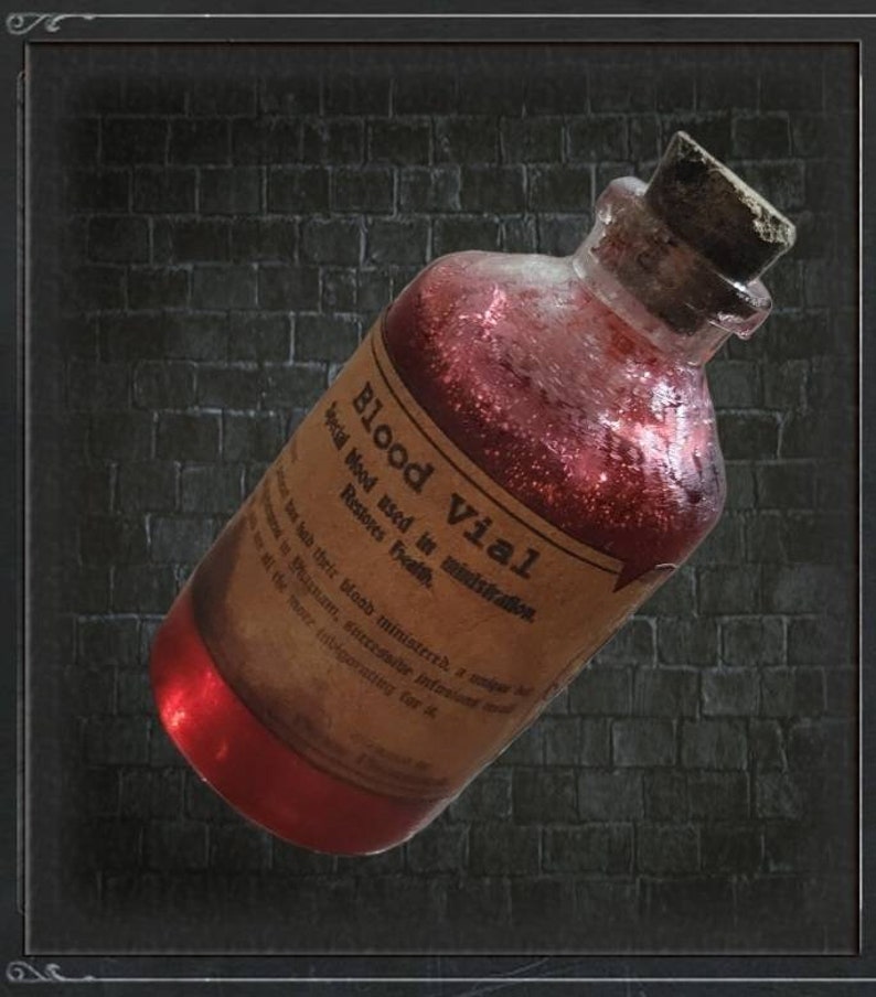 May include: A glass vial filled with a shimmering red liquid, labeled "Blood Vial." The label is aged and worn, with text indicating its use in ministration and restoring health. The vial is sealed with a cork stopper, set against a dark brick background.