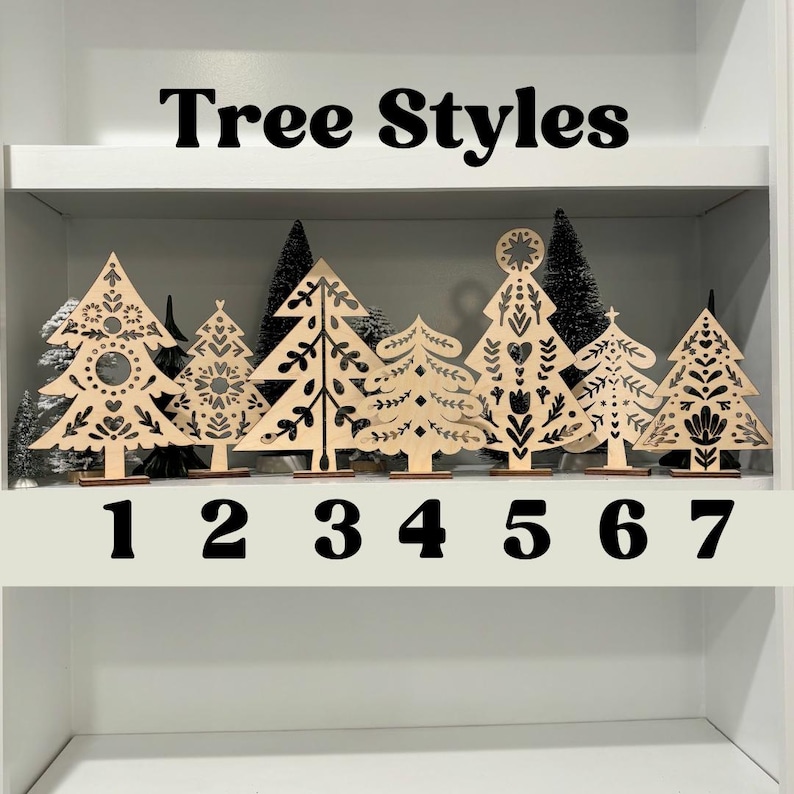 May include: Seven different styles of wooden Christmas tree ornaments with black and white designs. The ornaments are numbered 1 through 7. The text "Tree Styles" is at the top of the image.