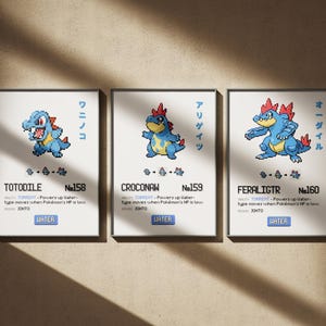 Könnte beinhalten: Drei Pokémon-Karten mit Totodile, Croconaw und Feraligatr. Die Karten sind weiß mit schwarzen Rändern und zeigen den Namen, die Nummer und den Typ des Pokémon. Die Karten sind in einer Reihe von links nach rechts angeordnet.