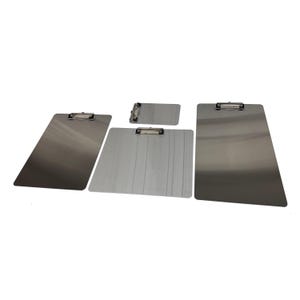 May include: A collection of silver metal clipboards in various sizes. Each clipboard has a metal clip at the top for securing papers. The surfaces have a brushed metal finish, and the clipboards are arranged on a white background.