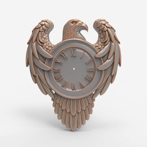 May include: A bronze-colored wall clock in the shape of an eagle with outstretched wings. The clock face is gray with Roman numerals. The eagle's head is at the top, and the wings and tail feathers are detailed.