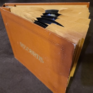 Vintage 45 rpm Record Album with 12 Random Vinyl Records