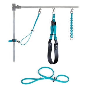 May include: Three turquoise camera straps hanging from a metal bar. The straps are made of a soft, durable material and feature a variety of styles, including a neck strap, a sling strap, and a wrist strap.
