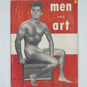 May include: Vintage magazine cover with the text "men and art" in white on a red and white background. The cover features a black and white photograph of a seated, muscular person.