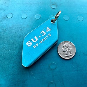 Pilot сollectable gifts planetags from the Russian Su-34 plane shot down over Kharkov on March 6, 2022 Aircraft Skin Keyring
